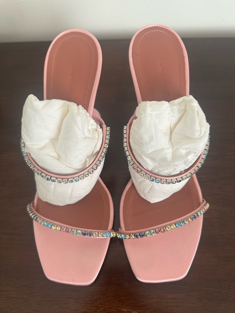 Amina Muaddi pink heels with rainbow crystal straps